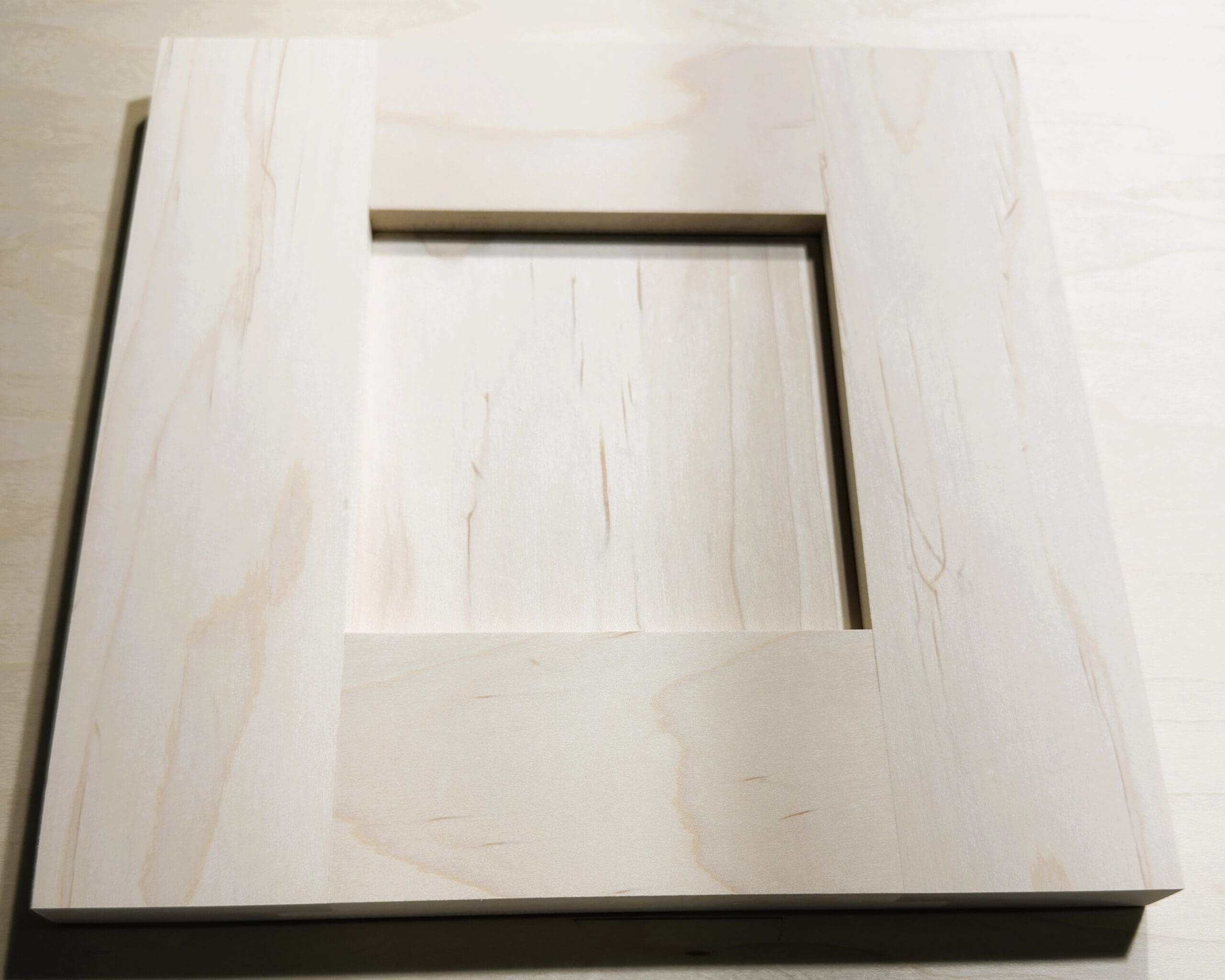 Flat-panel door sample with square inside-edge profile