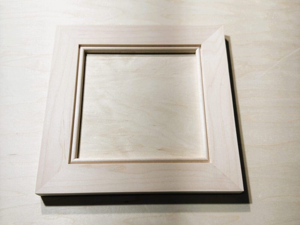 Mitered flat-panel door sample with inside-bead profile