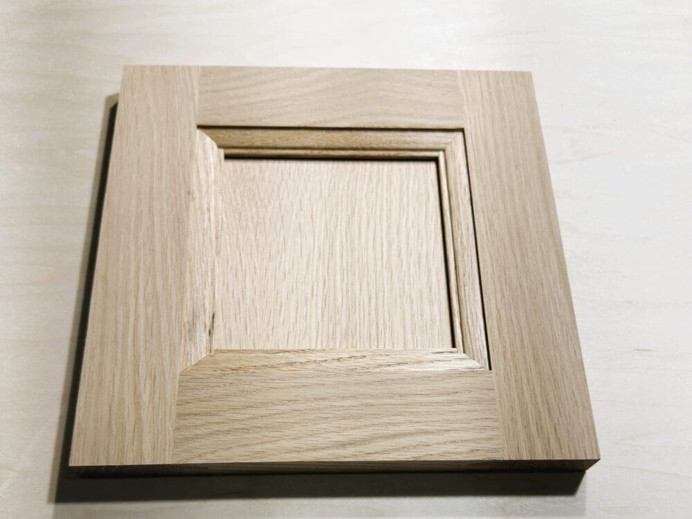 Flat-panel door sample with F-bead inside-edge profile in White Oak